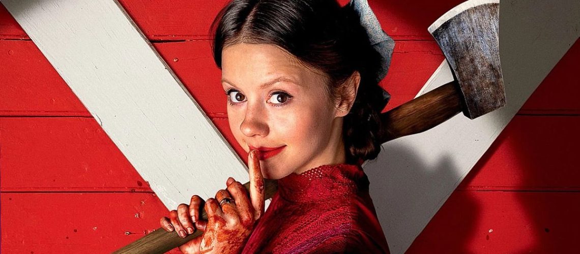 Mia Goth as Pearl, holding an axe in the