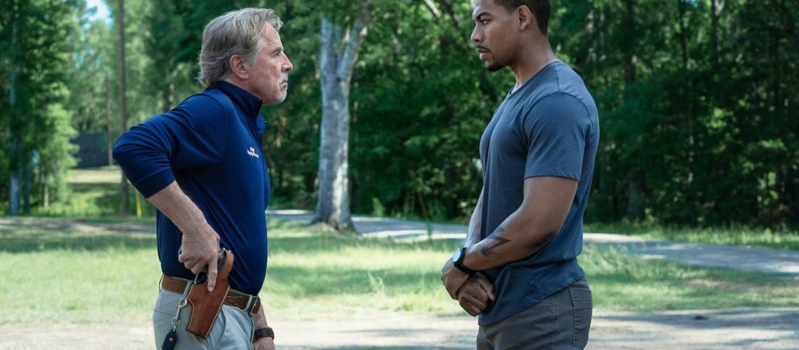 (L-R) Don Johnson as Chief Sandy Burnne and Aaron Pierre as Terry Richmond in "Rebel Ridge" streaming on Netflix from September 6