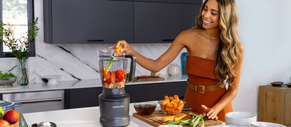 Nutribullet SmartSense blender being used in a kitchen