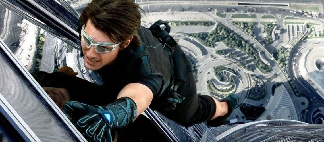 Tom Cruise scales a building in Mission Impossible Ghost Protocol