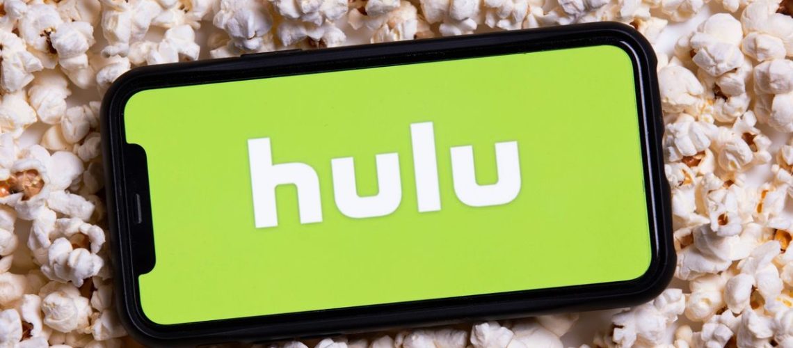 Hulu logo on iPhone on top of popcorn