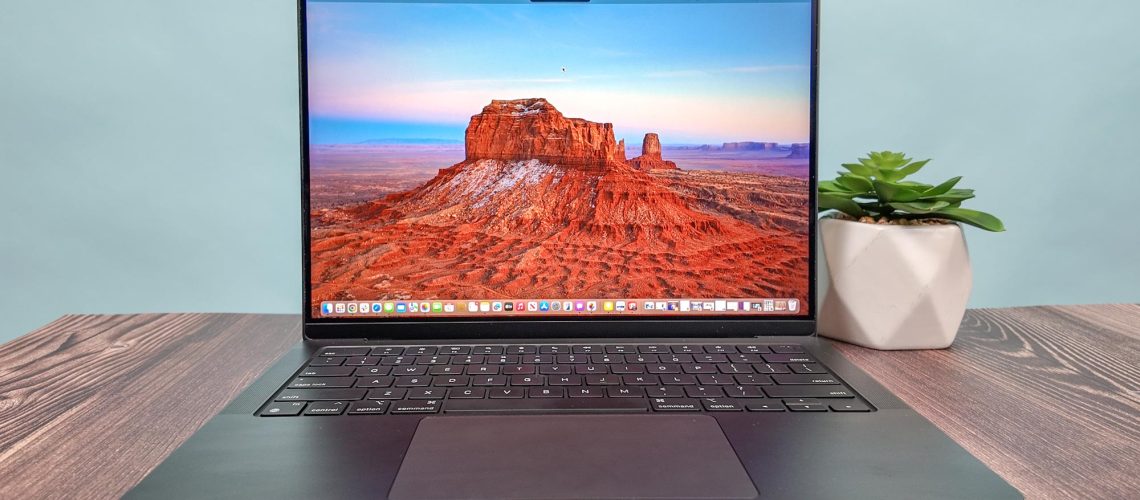 MacBook Pro 14-inch (2024, M4) shown open on a table