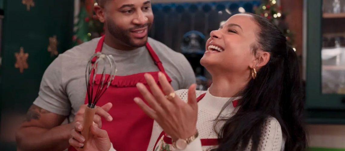 Devale Ellis as Teddy and Christina Milian as Layla in Meet Me Next Christmas