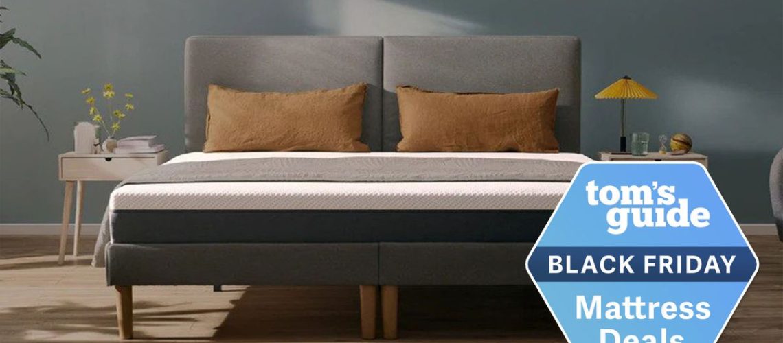 Emma Mattress shown on a fabric bed frame and with a Black Friday mattress deals badge overlaid on the image