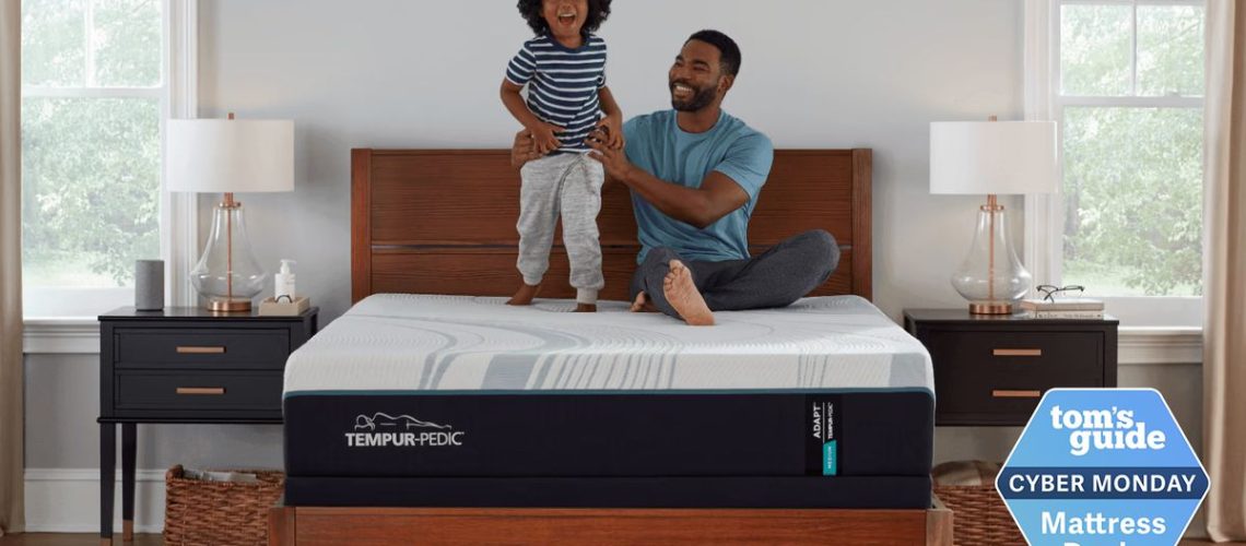 Dad and son playing on a Tempur-Pedic mattress in a bedroom, with a badge saying: