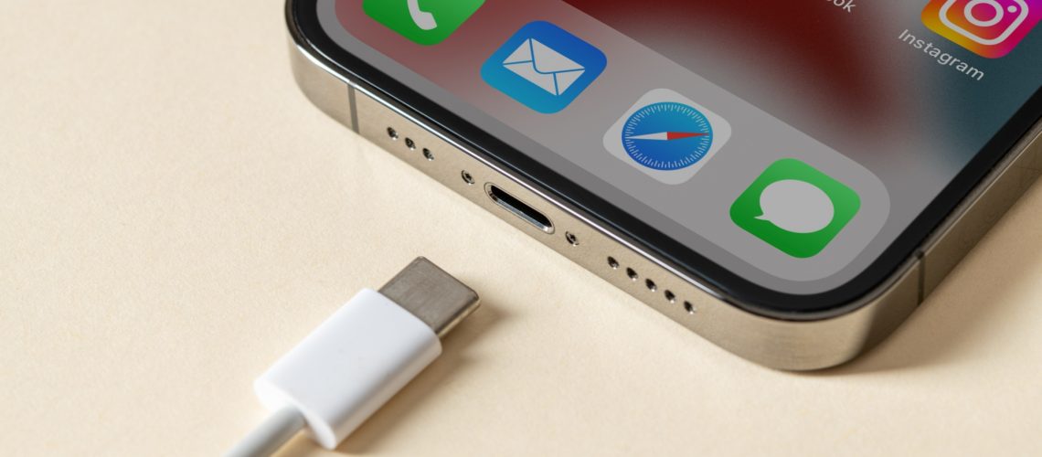 iPhone with USB-C charging cable