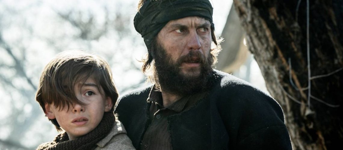 (L to R) Preston Mota as Devin Rowell, Taylor Kitsch as Isaac in "American Primeval"