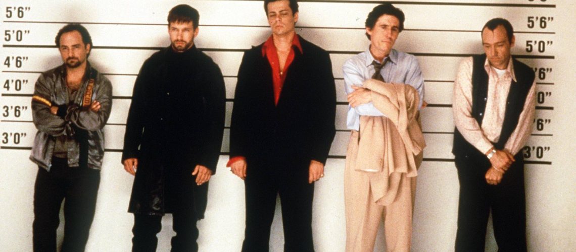 (left to right) Kevin Pollack, Stephen Baldwin, Benicio del Toro, Gabriel Byrne and Kevin Spacey in a police lineup in The Usual Suspects