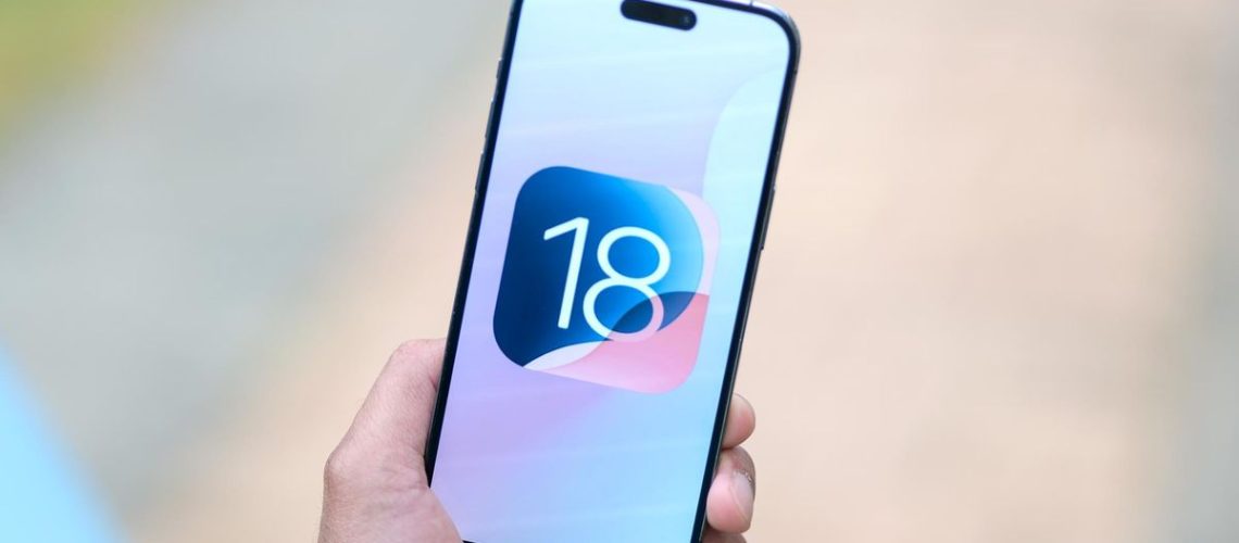 iOS 18 logo on an iPhone 15 Pro