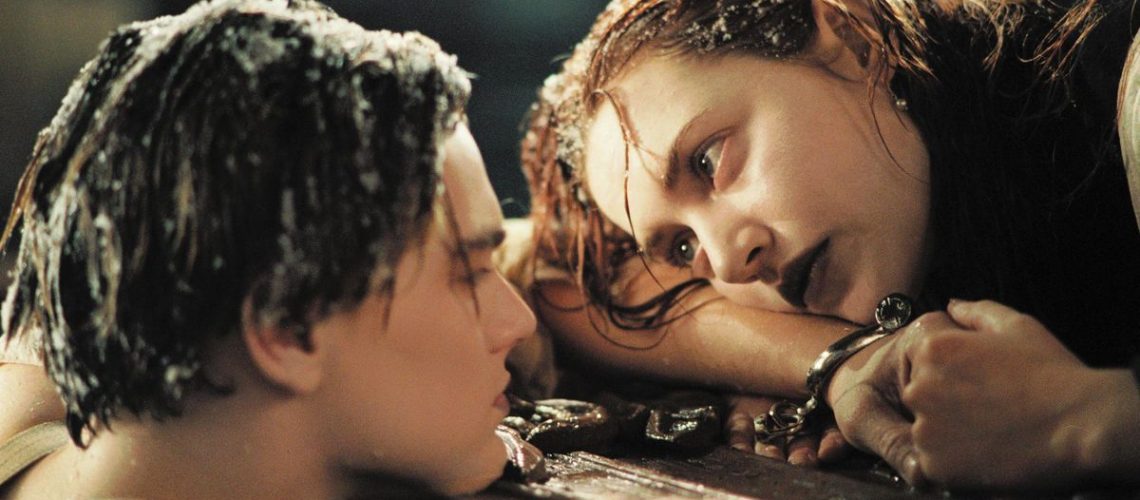(L, R) Leonardo DiCaprio as Jack, in the water next to Kate Winslet as Rose, on the door, in Titanic