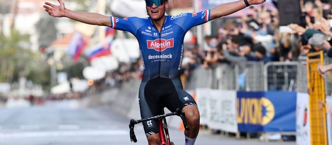 Mathieu Van Der Poel of The Netherlands crosses the finish line on his bike ahead of the Milano-Sanremo 2025 race.
