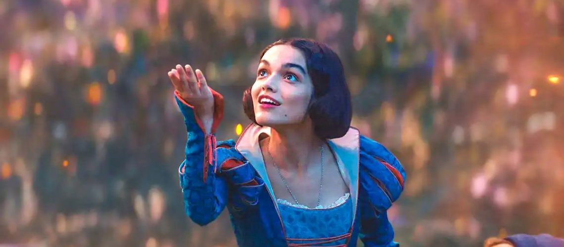 Snow White (Rachel Zegler) holding a bird in a scene from the live-action "Snow White" remake