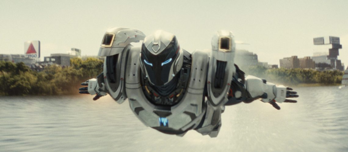 Riri Williams (Dominique Thorne) flies across a river in the Ironheart suit in a scene from Marvel's &quot;Ironheart&quot; tv show