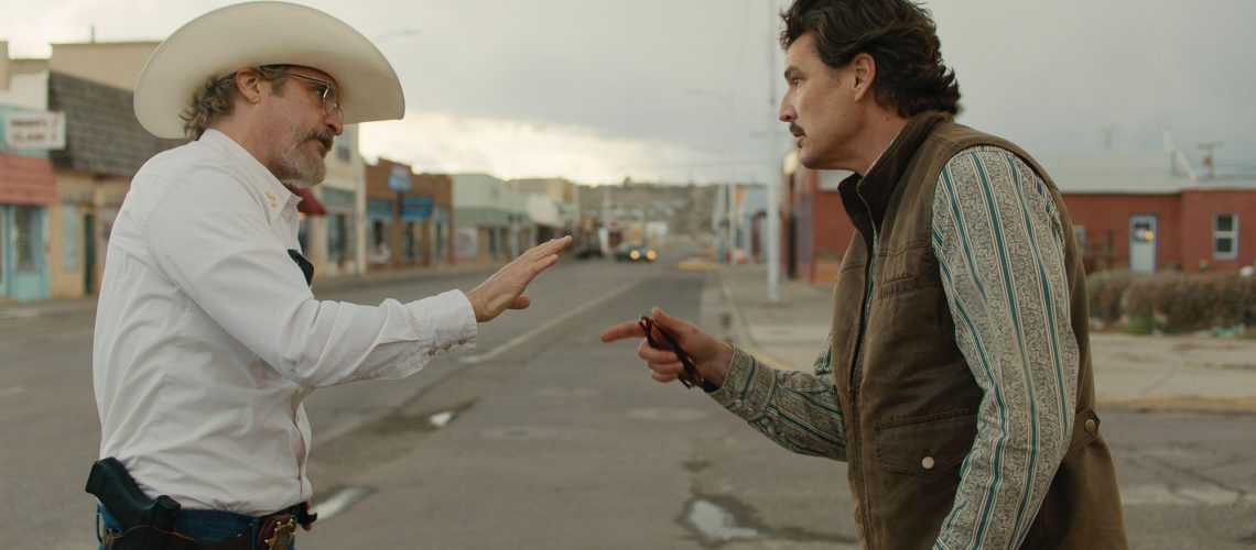 (From L to R) Joaquin Phoenix as Joe Cross and Pedro Pascal as Ted Garcia in the A24 movie Eddington