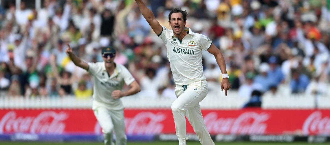 Mitchell Starc of Australia celebrates dismissing Aiden Markram of South Africa during day one of the ICC World Test Championship Final between South Africa and Australia