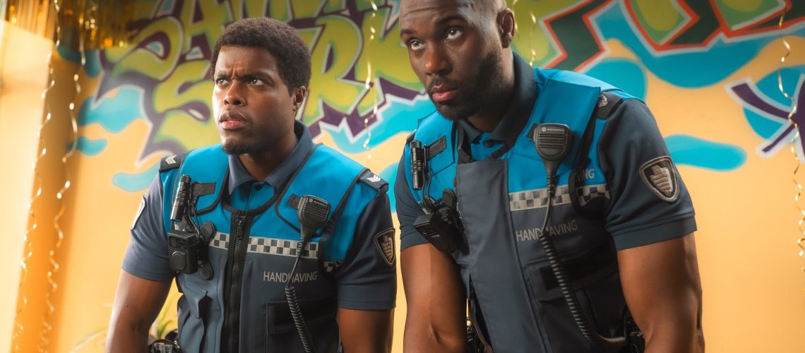 L-R: Ramon (Jandino Asporaat) and Jack (Werner Kolf) in uniform in a scene from Netflix's "Almost Cops"