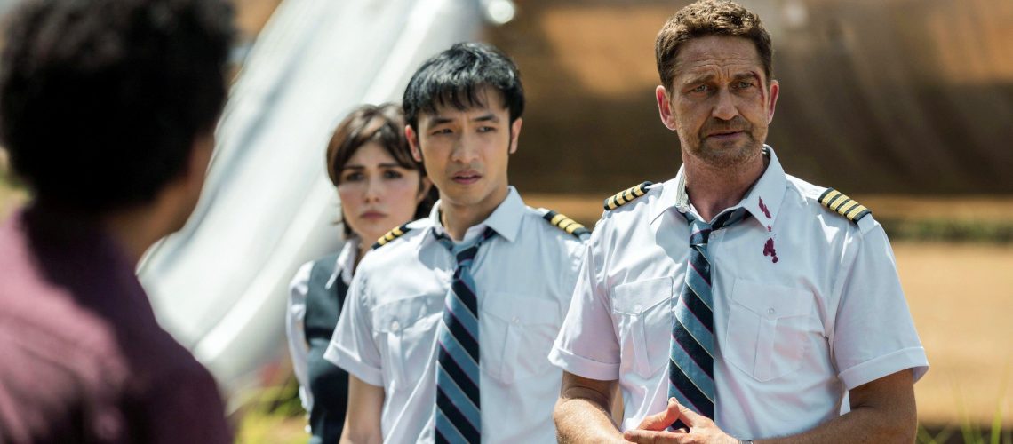 (From L to R) Daniella Pineda as stewardess Bonnie Lane, Yoson An as pilot Dele, and Gerard Butler as pilot Brodie Torrance in Plane (2023)