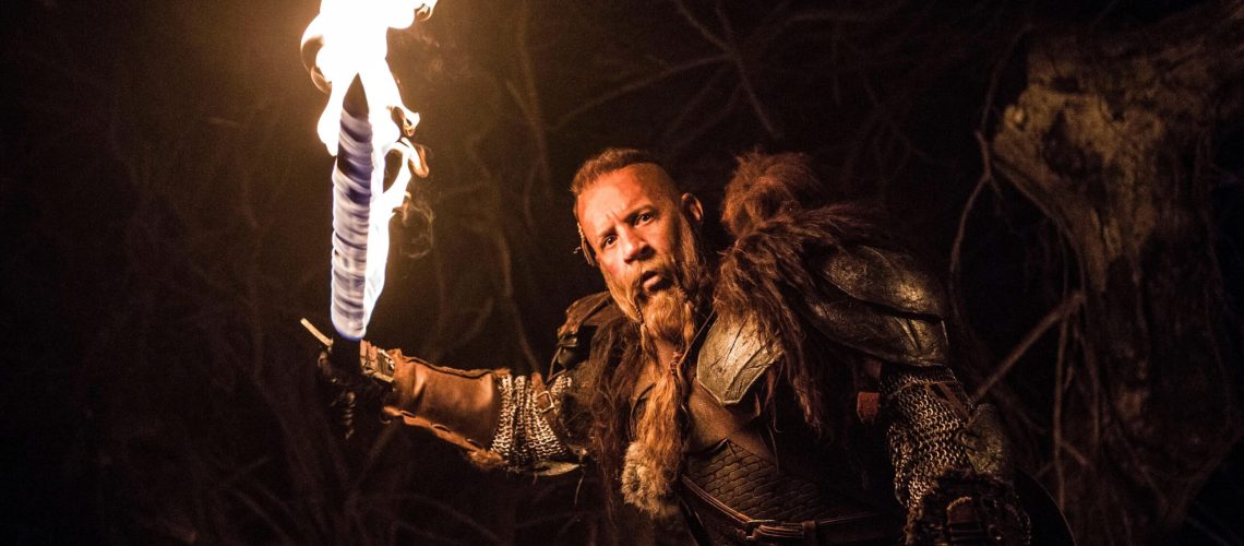 Kaulder (Vin Diesel) in medieval wear and wielding a flaming sword in a scene from "The Last Witch Hunter"