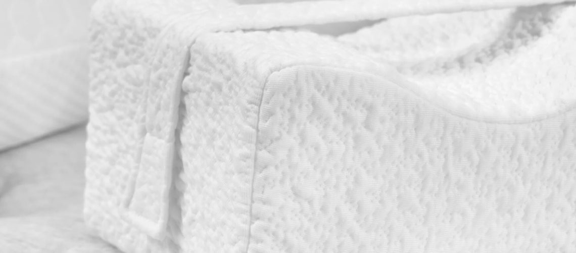 Brooklyn Bedding knee pillow close-up shot showing the cover texture and strap