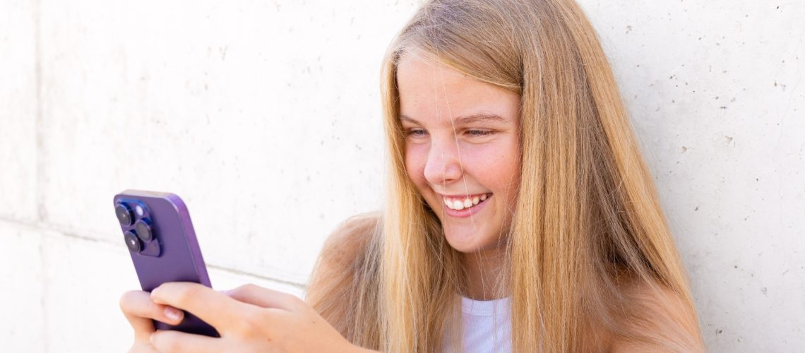 teen girl using phone