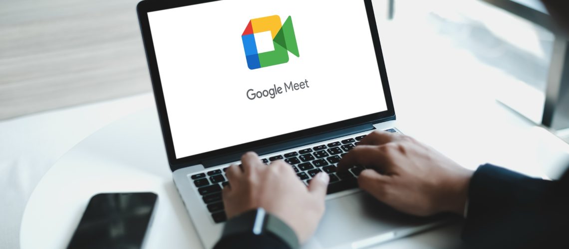 Google Meet logo on laptop