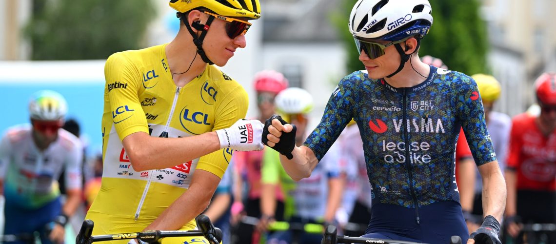Tadej Pogacar and Jonas Vingegaard exchange a gesture before a stage at the Tour de France.