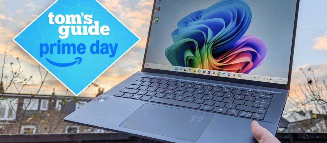 Hand holding Acer Swift 14 AI against sky with Tom