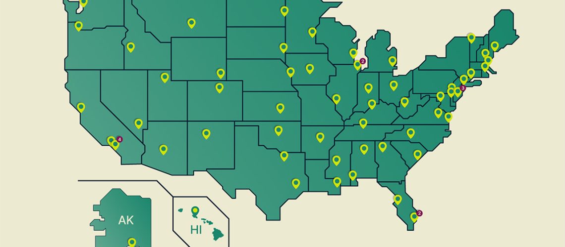 ExpressVPN graphic showing a server in every US state. There is a green map of the US, with the states outlined, and lime green markers detailing the location of each server