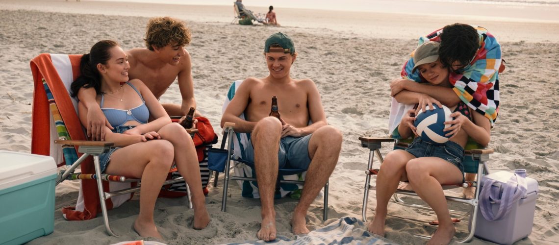 L-R: Belly (Lola Tung), Jeremiah (Gavin Casalegno), Conrad (Christopher Briney), Steven (Sean Kaufman) and Taylor (Rain Spencer) at the beach in "The Summer I Turned Pretty" season 3 on Prime Video