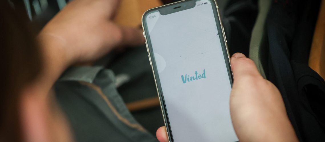 vinted logo on an iphone screen