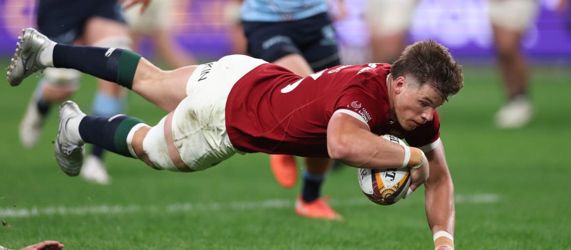 Huw Jones of the British &amp; Irish Lions dives in to score their first try during the tour match between NSW Waratahs and British &amp; Irish Lions at Allianz Stadium