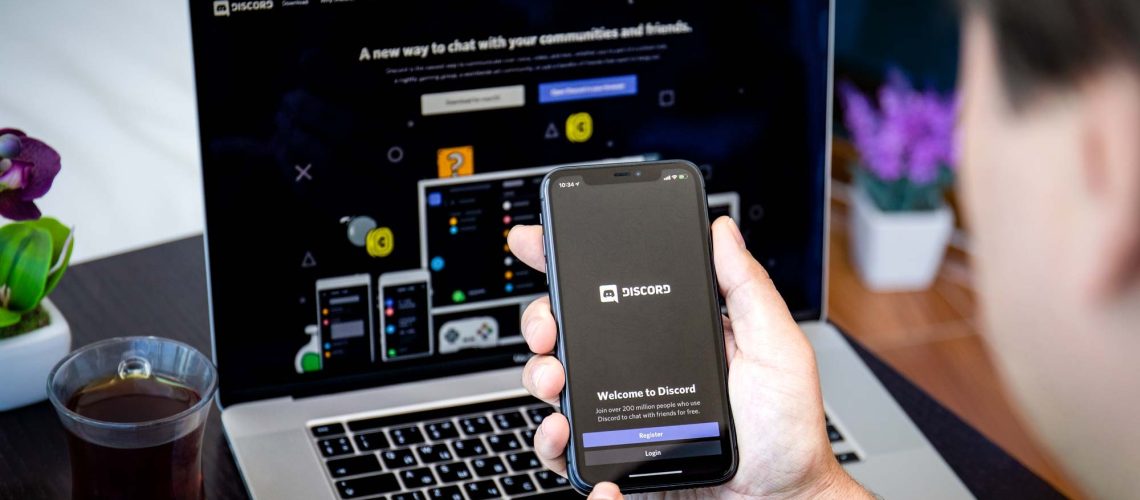 Discord on a phone and a laptop