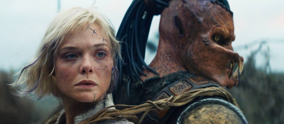 Thia (Elle Fanning) and Dek (Dimitrius Schuster-Koloamatangi) in 20th Century Studios' "Predator: Badlands"