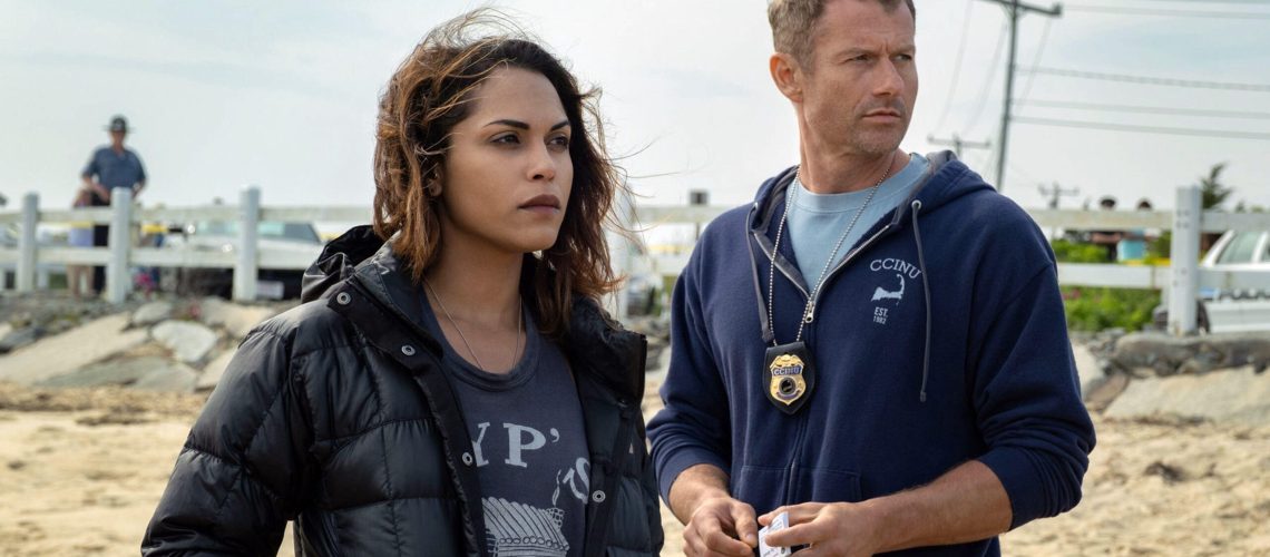 L-R: Monica Raymund, James Badge Dale stand on a beach in a scene from Starz crime drama, "Hightown"