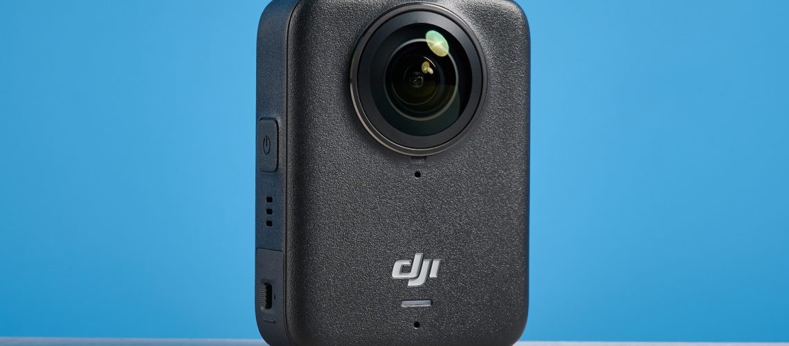 The DJI Osmo 360 against a blue background