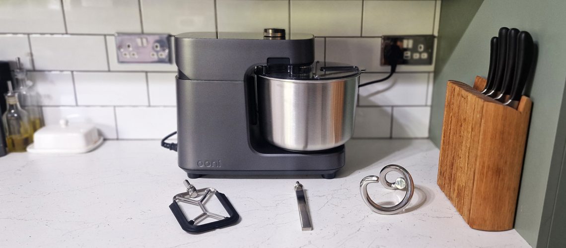 The Ooni Halo Pro Spiral mixer being tested in a green and white kitchen