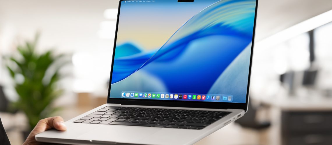 macOS Tahoe 26 desktop screen on an MacBook