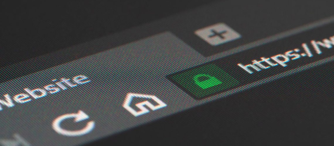 Close-up of a web browser's basic buttons and address bar in dark mode.