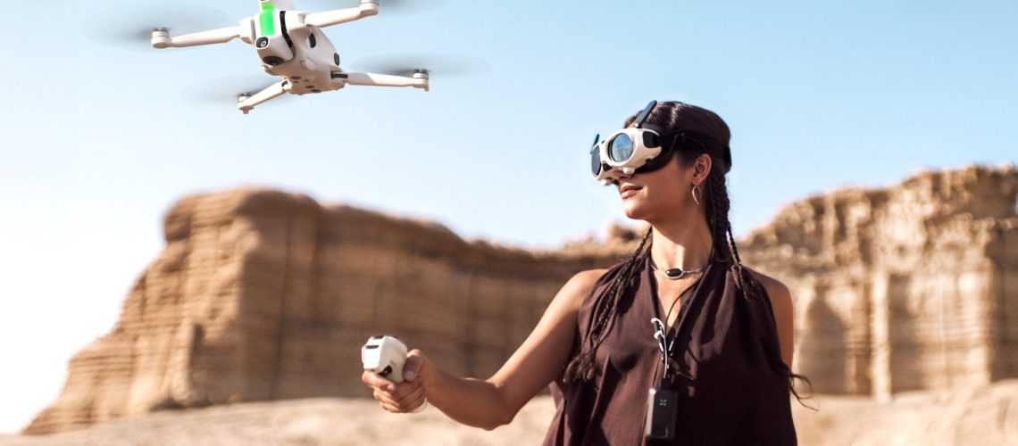 An Antigravity A1 drone being flown by a woman