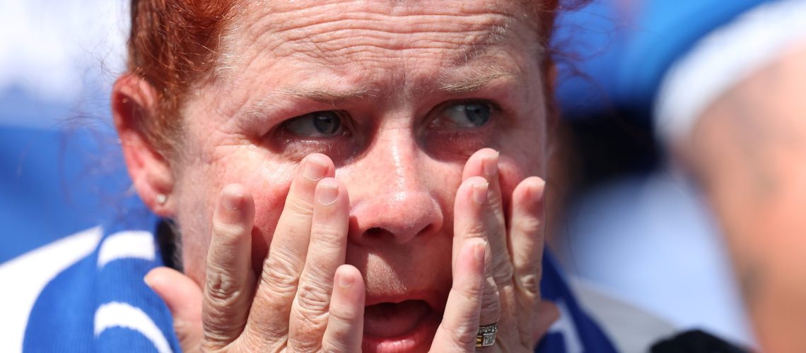 LIVERPOOL, ENGLAND - A fan of Everton appears emotional inside the stadium following their team's victory in the Premier League match between Everton FC and Southampton ahead of the Premier League 2025/26 season.