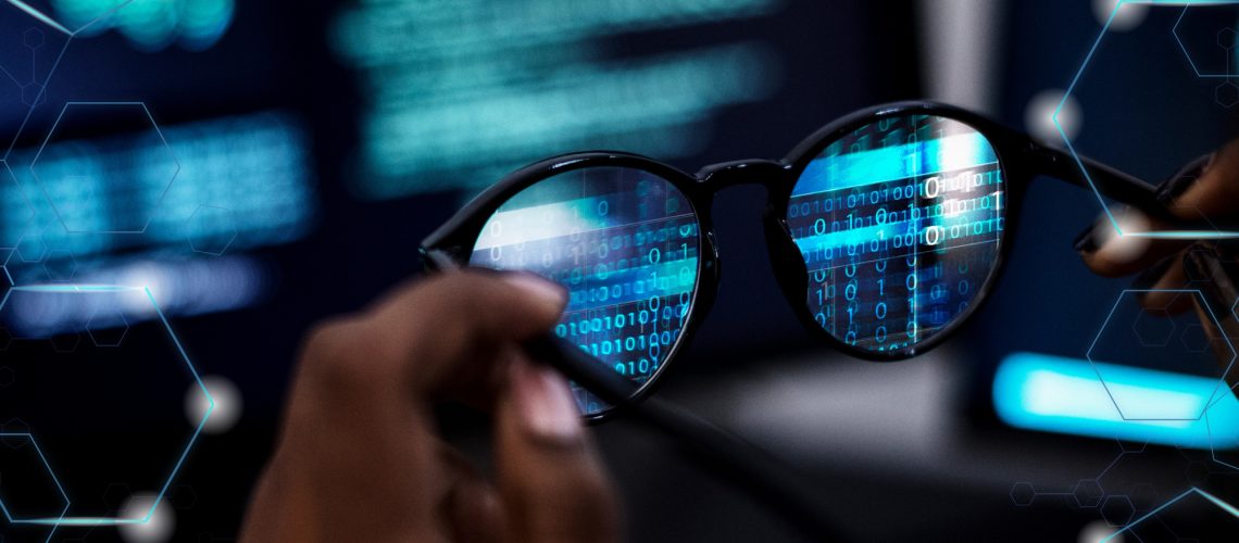 image of computer code in glasses