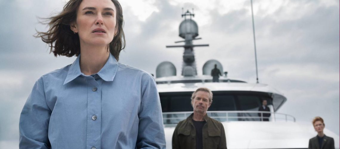 (L-R) Keira Knightley and Guy Pearce in "The Woman in Cabin 10" coming to Netflix in 2025