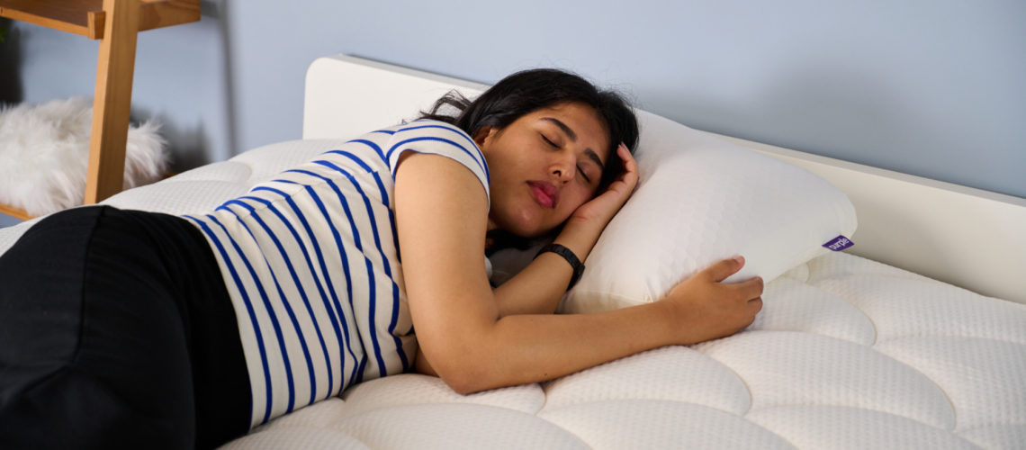 TG bedding writer sleeping on the Purple GridCloud pillow