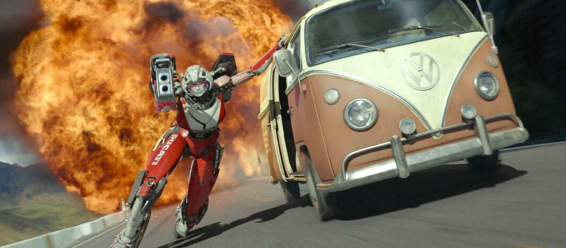Arcee (voiced by Liza Koshy) holds onto a Volkswagen bus to outrun an explosion in Transformers: Rise of the Beasts