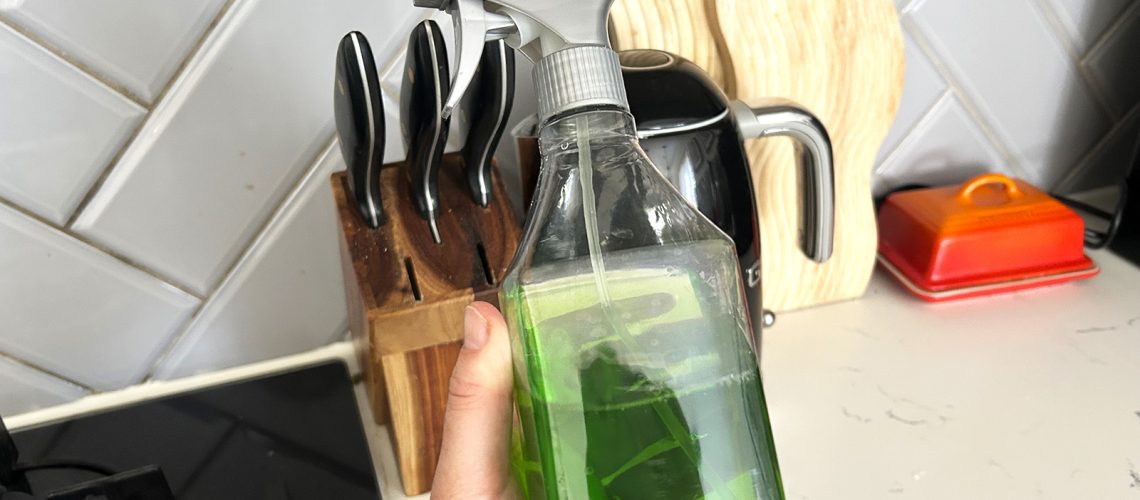 Homemade cleaning spray in a kitchen