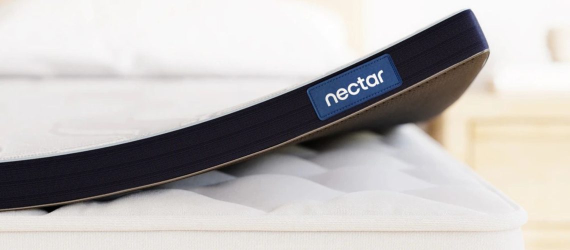 The Nectar Mattress Topper on a quilted pillow-top mattress.