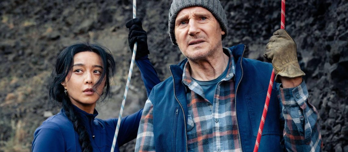 (L-R) Fan Bingbing as Dhani Yangchen and Liam Neeson as Mike McCann in "Ice Road: Vengeance"