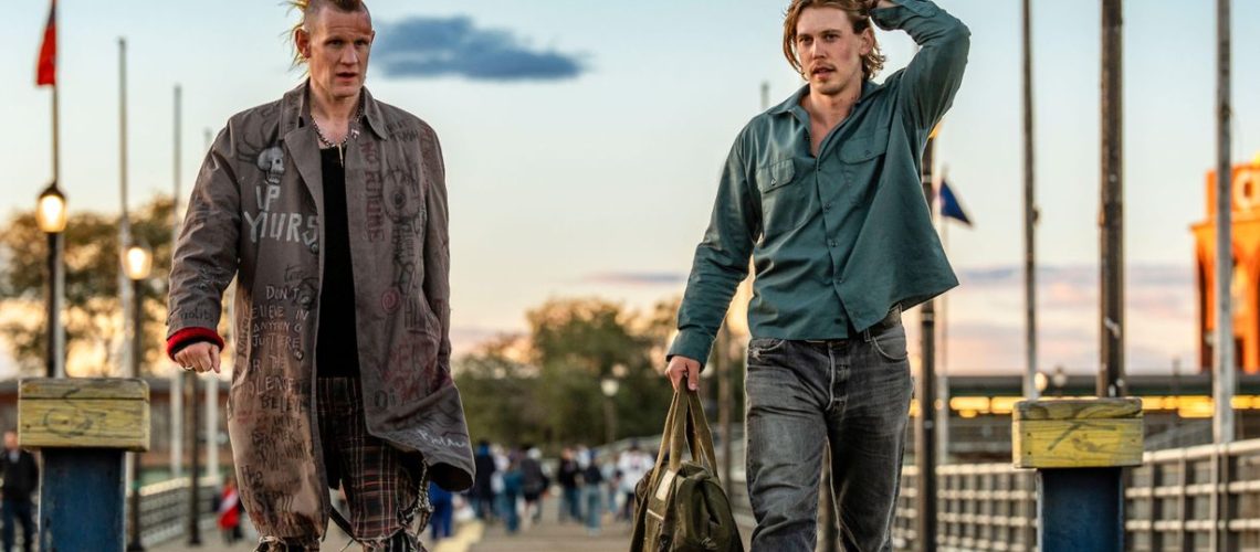 L-R: Russ (Matt Smith) and Hank (Austin Butler) walk side-by-side in a scene from "Caught Stealing"