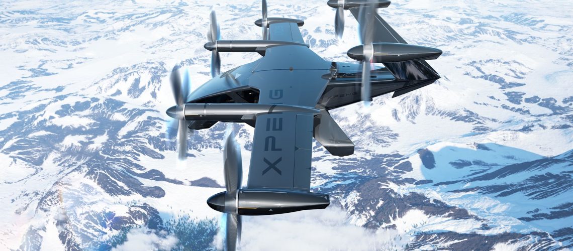 The Xpeng A868 flying car shown flying above a snowy mountain range.