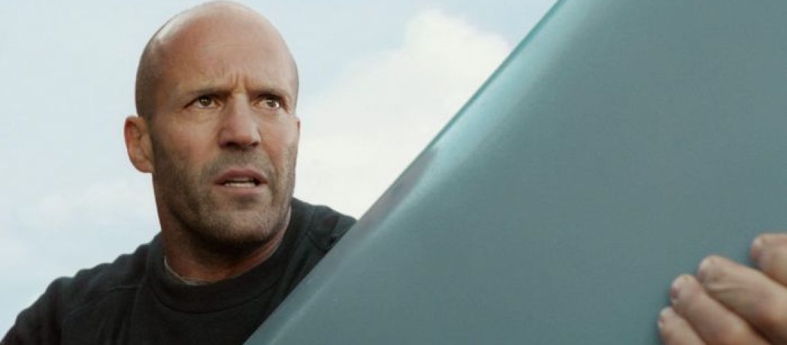 Jonas (Jason Statham) holding a pole in a scene from "Meg 2: The Trench"